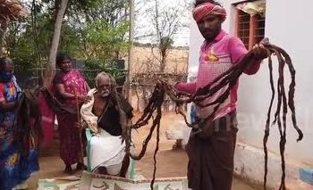OD ROĐENJA SE NIJE ŠIŠAO, A IMA 94 GODINE: Ovaj Indijac je pustio kosu dužu od 7 metara, u njegovom rodnom gradu POŠTUJU GA KAO BOŽANSTVO!